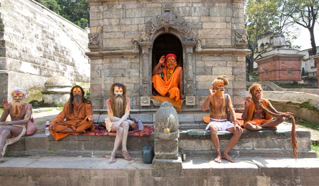 KATHMANDU, NEPAL - CIRCA 2008: Sadhu Holy men relax at Pashupatinath Temple circa 2008 in Kathmandu, Nepal.
